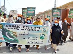 Participants take part in an awareness walk outside the Balochistan Assembly on World Anti-Narcotics Day, organized jointly by the Social Welfare Department and the Anti-Narcotics Force.
