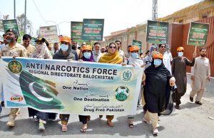 Participants take part in an awareness walk outside the Balochistan Assembly on World Anti-Narcotics Day, organized jointly by the Social Welfare Department and the Anti-Narcotics Force.