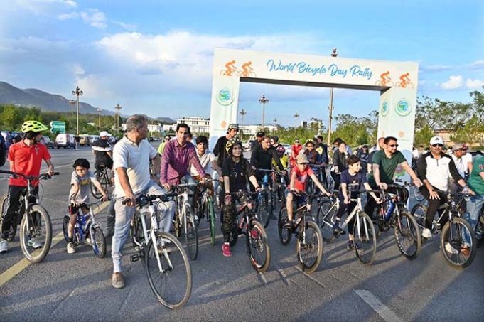 Participants ride through Islamabad from D-Chowk to Serena Hotel during the ‘World Bicycle Day Rally’ organized by the Embassy of Turkmenistan in collaboration with Serena Hotels, Sunday, June 1, 2025.