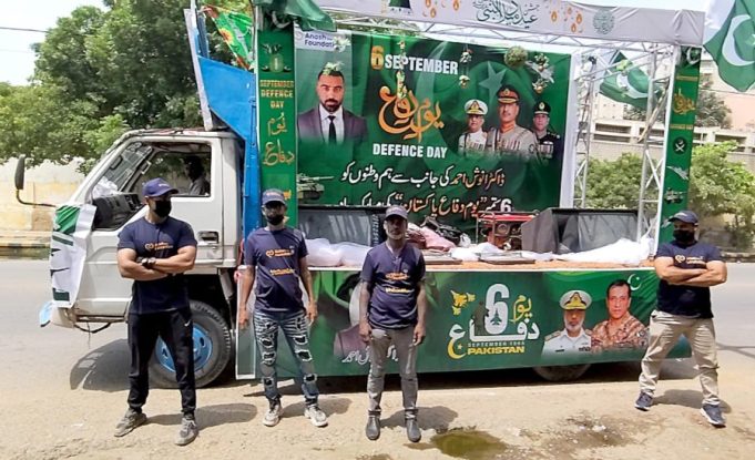Dr. Anosh Ahmed pays tribute to martyrs, veterans of 1965 war