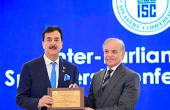 Chairman Senate Syed Yusuf Raza Gilani, Founding Chairman of the Inter-Parliamentary Speakers’ Conference, presents a commemorative shield to Prime Minister Muhammad Shehbaz Sharif.
