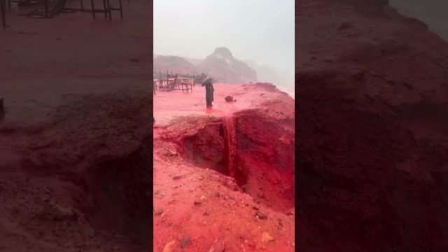 Heavy rainfall transforms Sahel Sorkh (Red Beach) on Iran’s Hormoz Island into a striking natural spectacle, as iron oxide–rich soil—dominated by the mineral hematite—intensifies the shoreline’s vivid red hue.