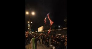 American flag burned in Athens as protesters rally in solidarity with Venezuela