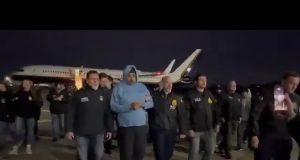 Venezuela’s President Nicolás Maduro being escorted from an aircraft by U.S. authorities in New York.