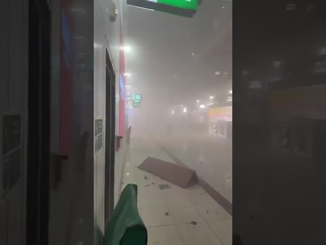 Damage is seen at Dubai International Airport after it was struck by an Iranian missile attack, prompting flight suspensions and emergency response measures.