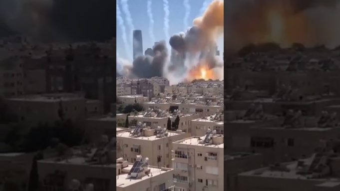 Iranian ballistic missiles striking central Israel; Tel Aviv impact areas hit as air defences tested