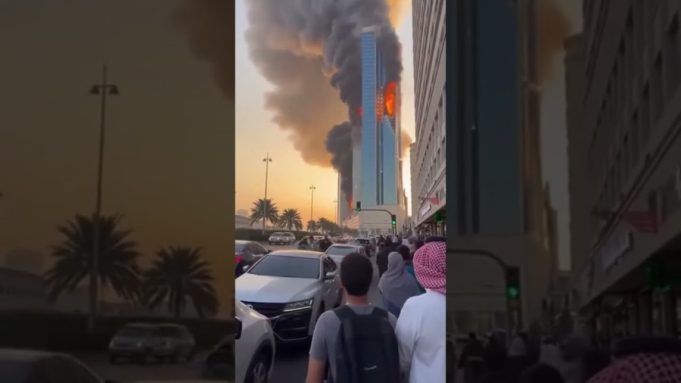 Smoke rises over Bahrain high-rise after Iranian drone strikes in escalating Gulf conflict